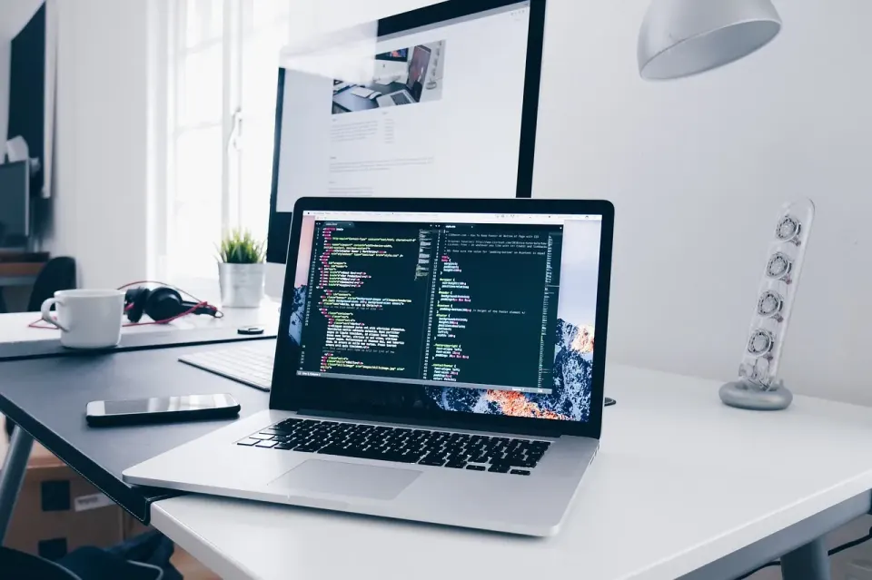 A laptop on a desk, the kind of screen where a browser shows a padlock