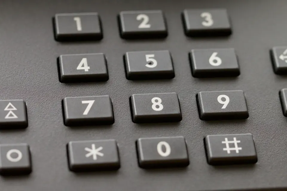 A close-up of a phone keypad, a reminder that scammers dial number lists rather than people