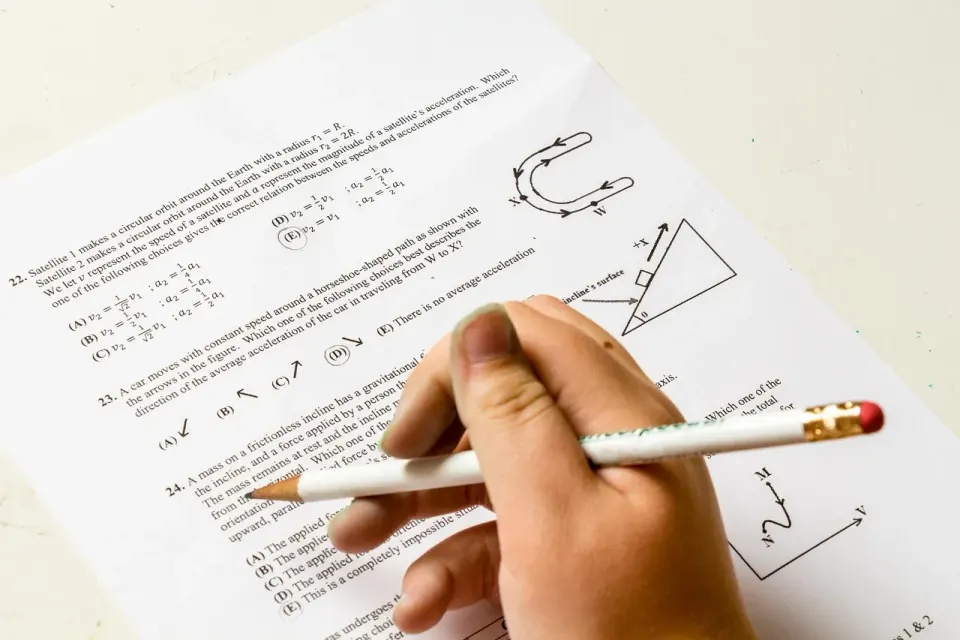 A student working through a written test, like a model graded only on right or wrong answers