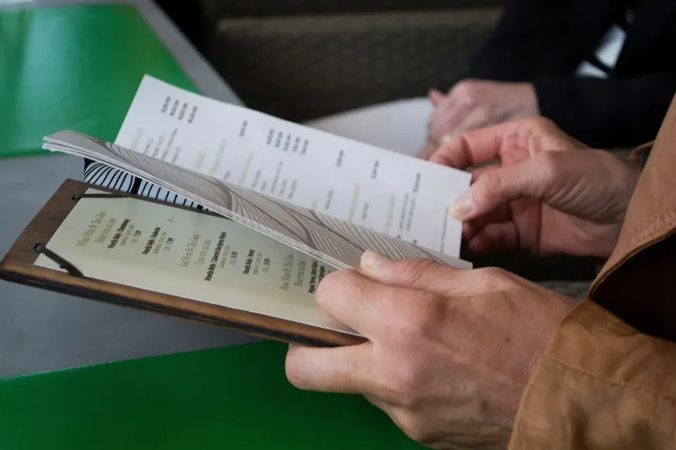hand, table, menu, reading